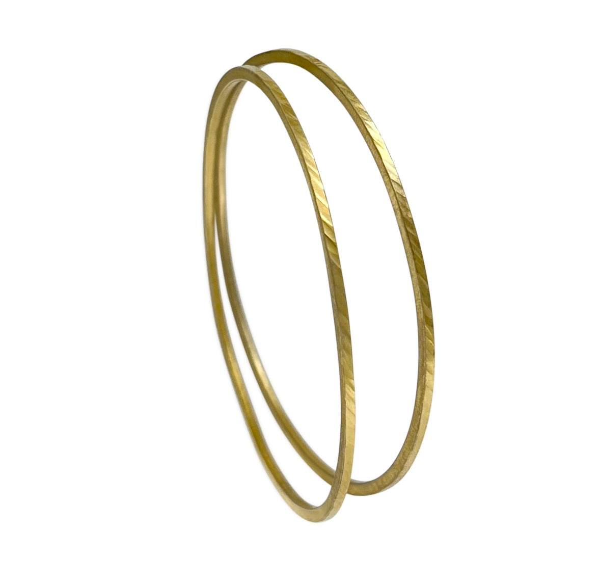 Skinny bangle (1.5mm wide) in sterling silver with Vermeil finish