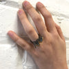 Tall wave ring in sterling silver with 14K yellow gold overlay shown on model by Ayesha Mayadas