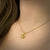 Coil style pendant in 18K yellow gold with diamond by Ayesha Mayadas