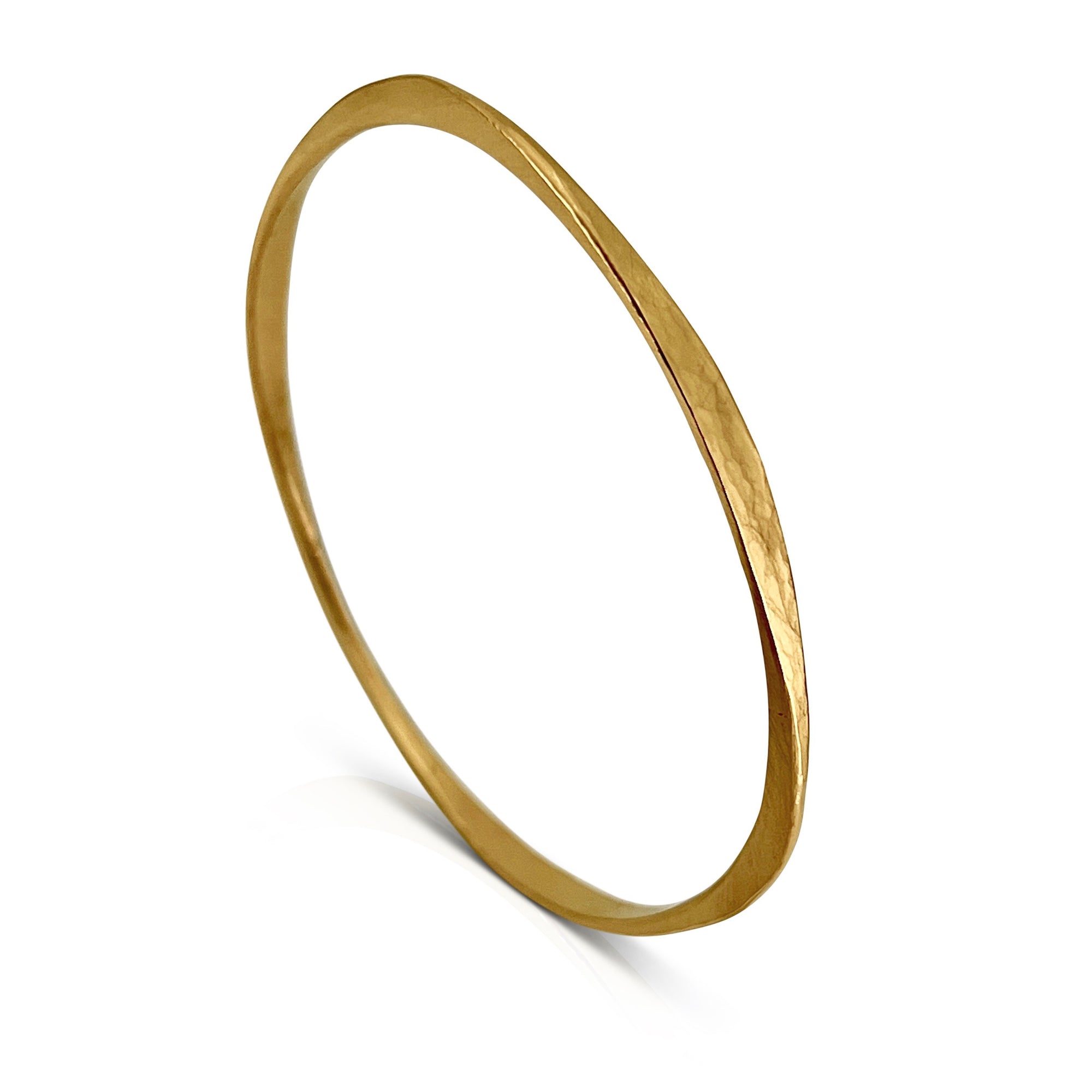 Forged sterling silver bangle bracelet with 18k yellow gold vermeil overlay by Ayesha Mayadas