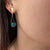 Ribbon earrings in 18K yellow gold with opals