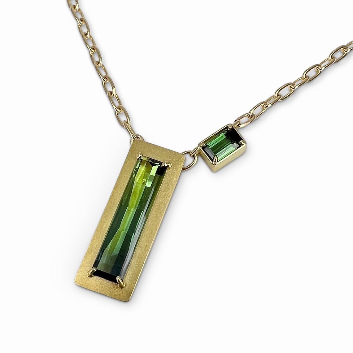 necklace with  rectangular cut green tourmalines in 18K yellow gold with 14K yellow gold chain by Ayesha Mayadas