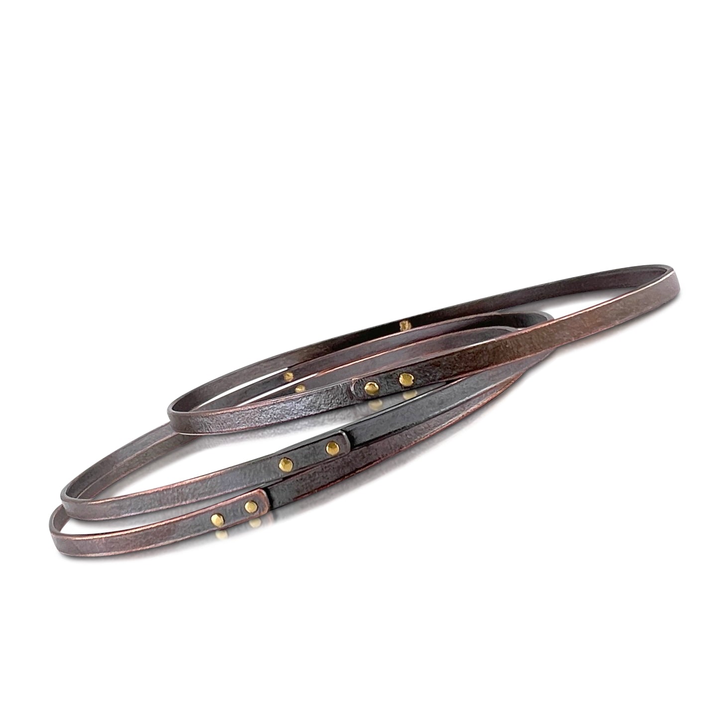 Fusion bangle in copper with 18K yellow gold rivets