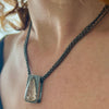 Pear shaped rutlilated quartz necklace on a multi sterling chain