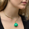 A luscious Chrysoprase and emerald pendant on an 18K gold neck wire