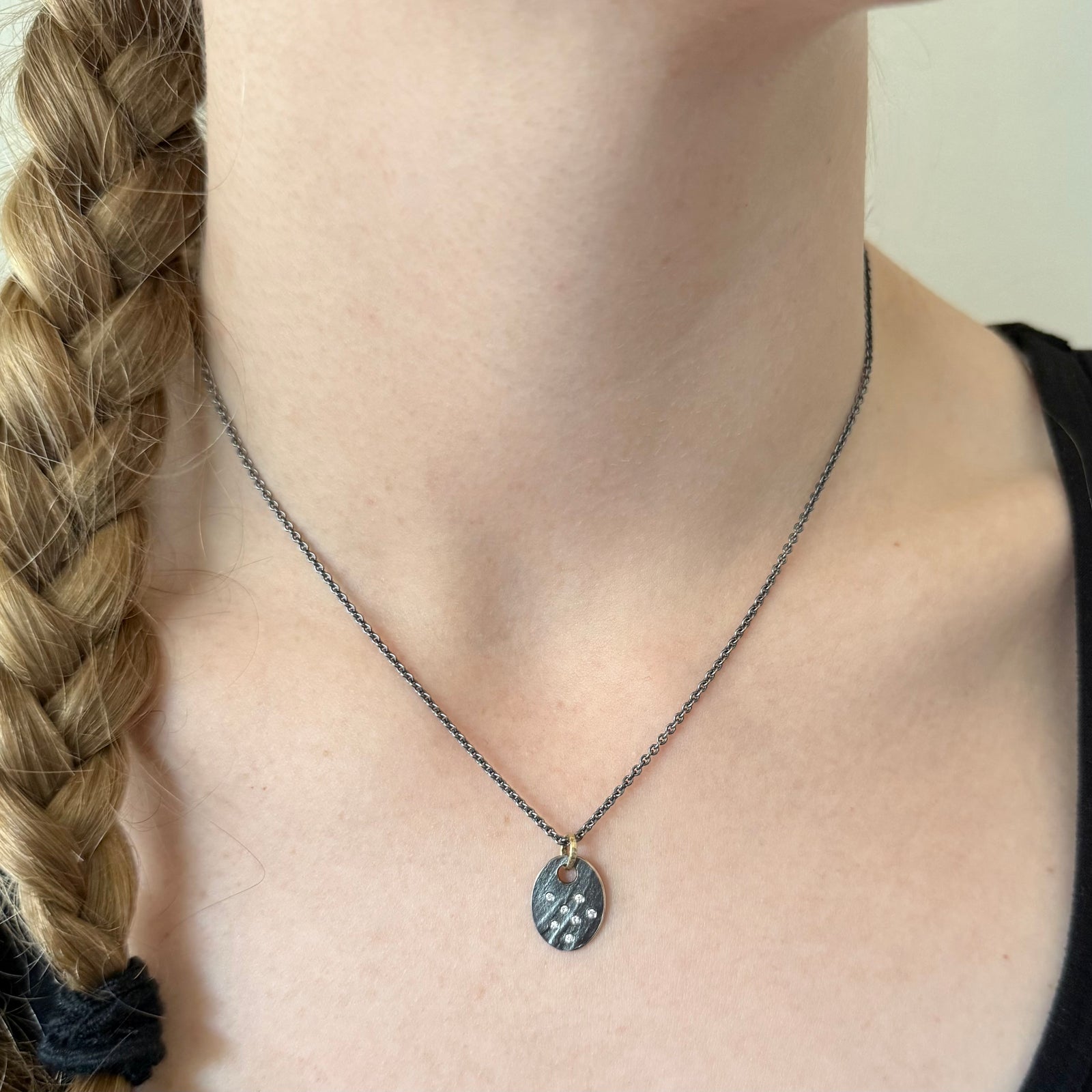 Oval disc pendant in Sterling Silver with diamonds