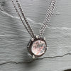 Round facetted rutilated quartz necklace with diamonds on multi-strand sterling chain