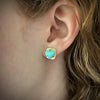 Sugarloaf Persian turquoise earrings in 18K yellow gold