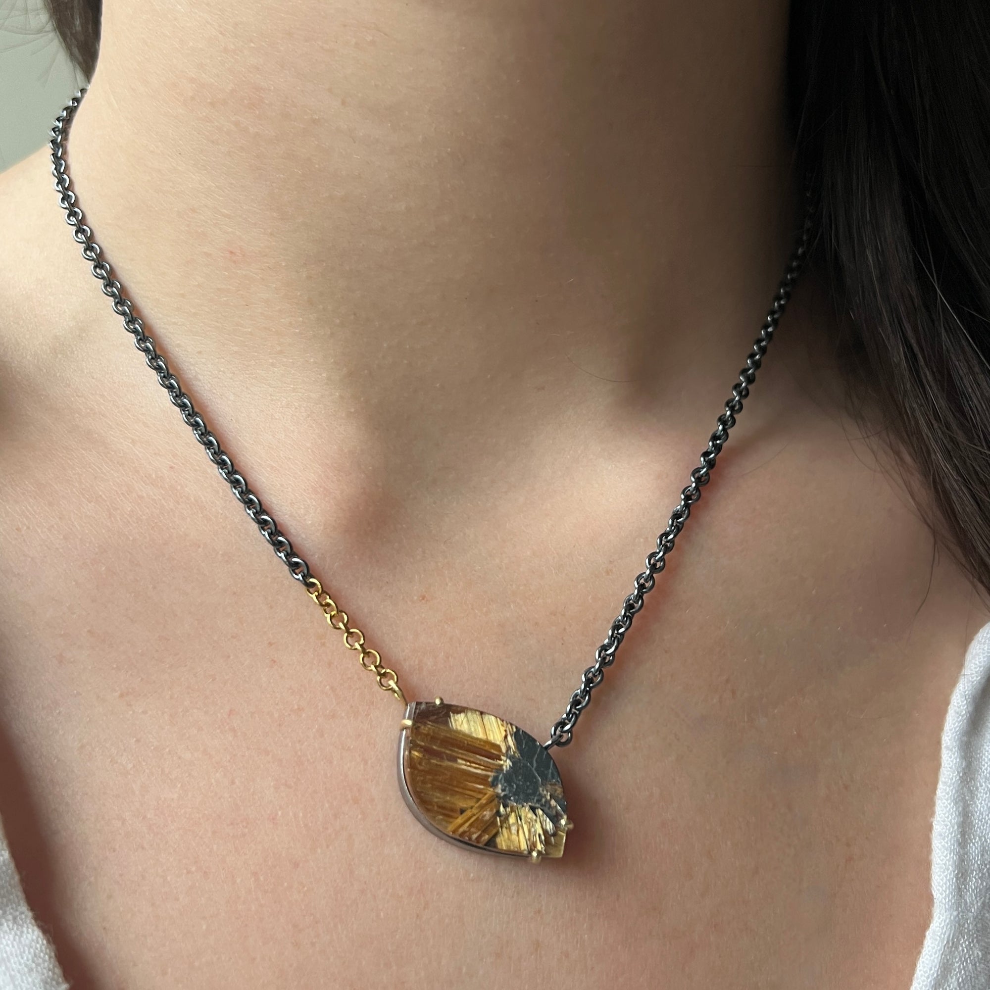 Necklace with navette shaped rutilated quartz in silver and gold