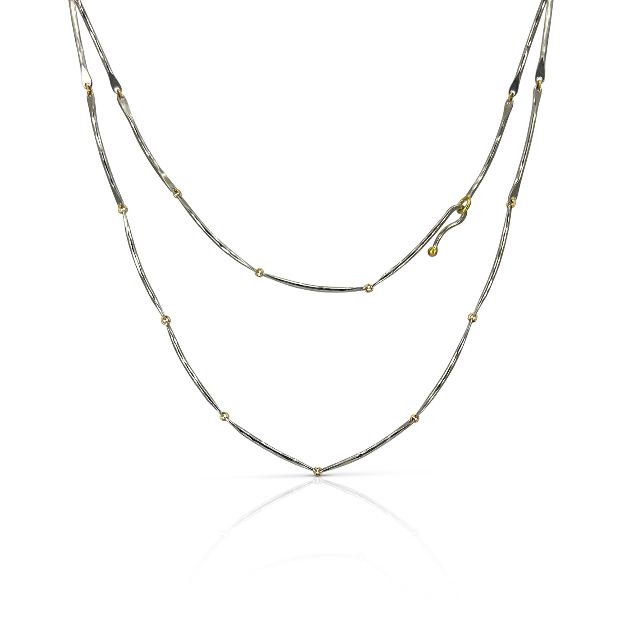 Liquid necklace in two-tones platinum and 18K yellow gold