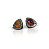 Geometric Sterling Silver earrings with 18kt gold rivets and oval Spessarsite garnet by Ayesha Mayadas