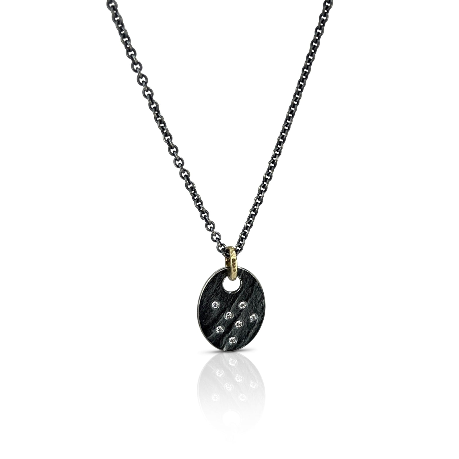 Oval disc pendant in Sterling Silver with diamonds