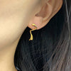 Twirl earrings in 18K yellow gold
