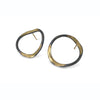 V forged hoops with a splash of 14K gold on oxidized sterling silver by Ayesha Mayadas