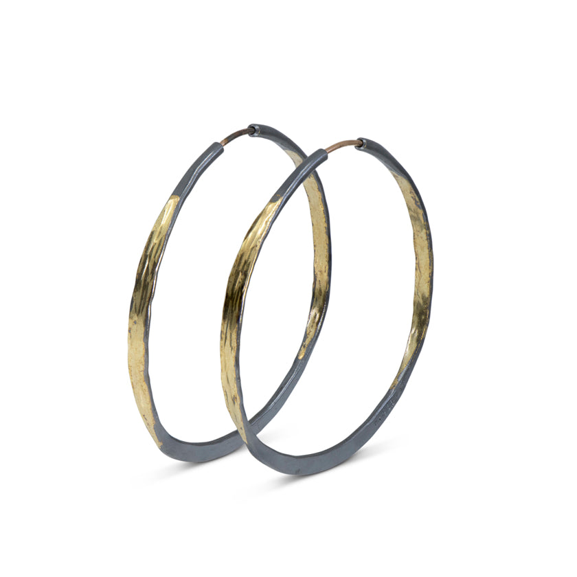 Off round Splash Hoop earrings with Barrel Closure in Sterling Silver and hammered 14K yellow gold by Ayesha Mayadas