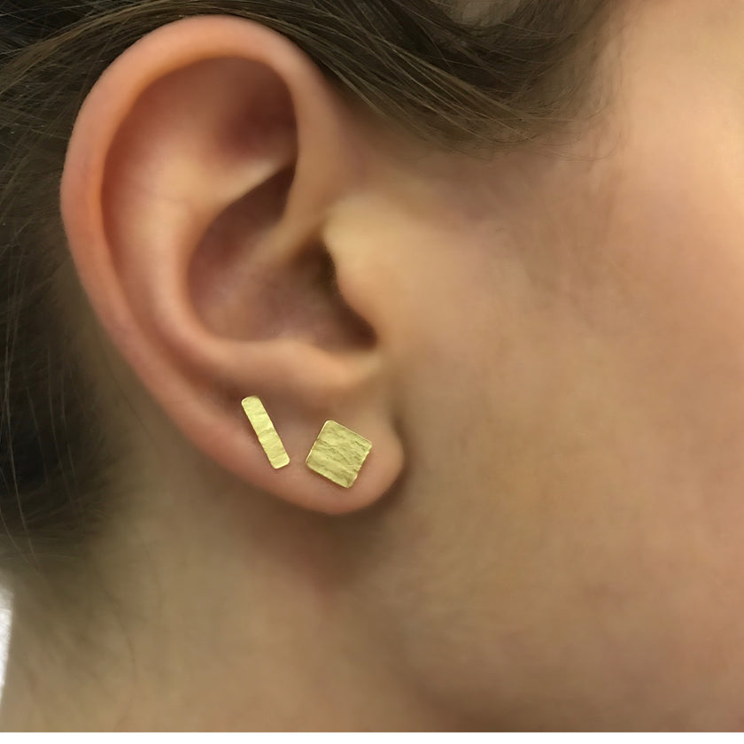 Mix-and-Match Wafer stud earrings in 18K yellow gold  shown on model post and back in 18K yellow gold by Ayesha Mayadas