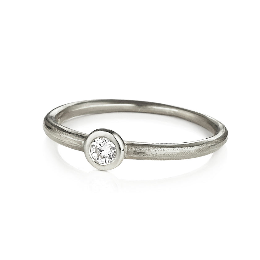 Tapered Forged Band in 18K yellow gold or platinum with Center 3mm Diamond by Ayesha Mayadas