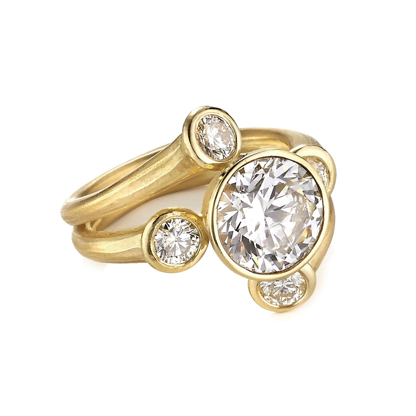 Star Cluster ring in 18K yellow gold with 4 1 ct diamonds and a 3 ct center diamond by Ayesha Mayadas