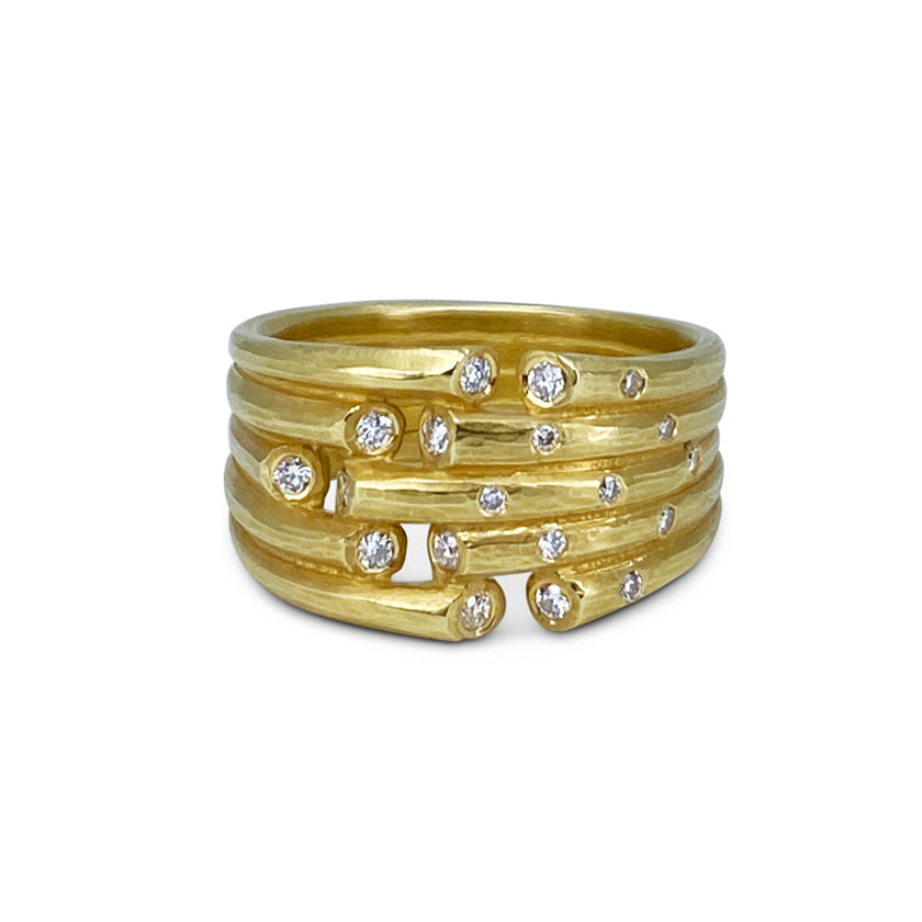 Whisper Ring in five layers of 18K yellow gold with an asymetric sprinkle of 19 small Diamond by Ayesha Mayadas