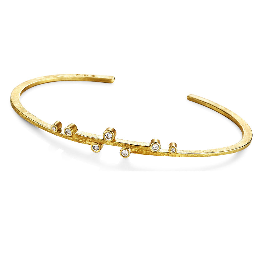 Stepped cuff with diamonds in 18K yellow gold by Ayesha Mayadas