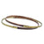 Rivet bangle bracelet in 18K yellow gold and copper slightly oval shaped by Ayesha Mayadas