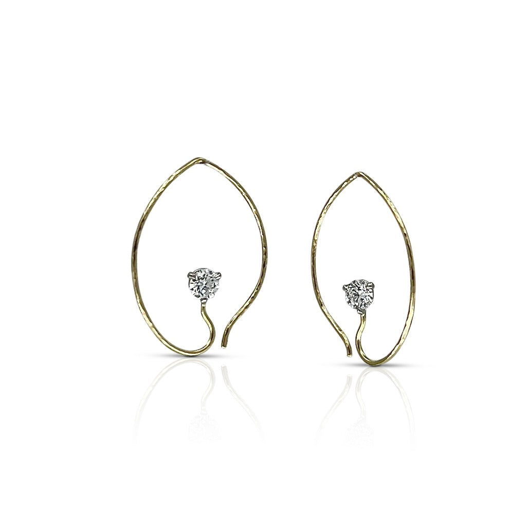 A sweet,hammered hoop with a sparkle. The setting is nearly invisible. 18K gold, 2 diamonds (0.50 ct tw, lab created G/H, VS) are prong set in platinum.  Model is wearing an 18K yellow gold version