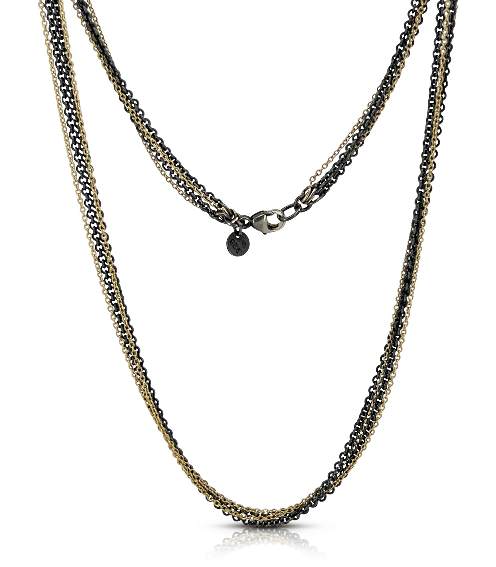 4 strand two-tone necklace in oxidized sterling silver and 14K yellow gold with lobster clasp shown on model by Ayesha Mayadas