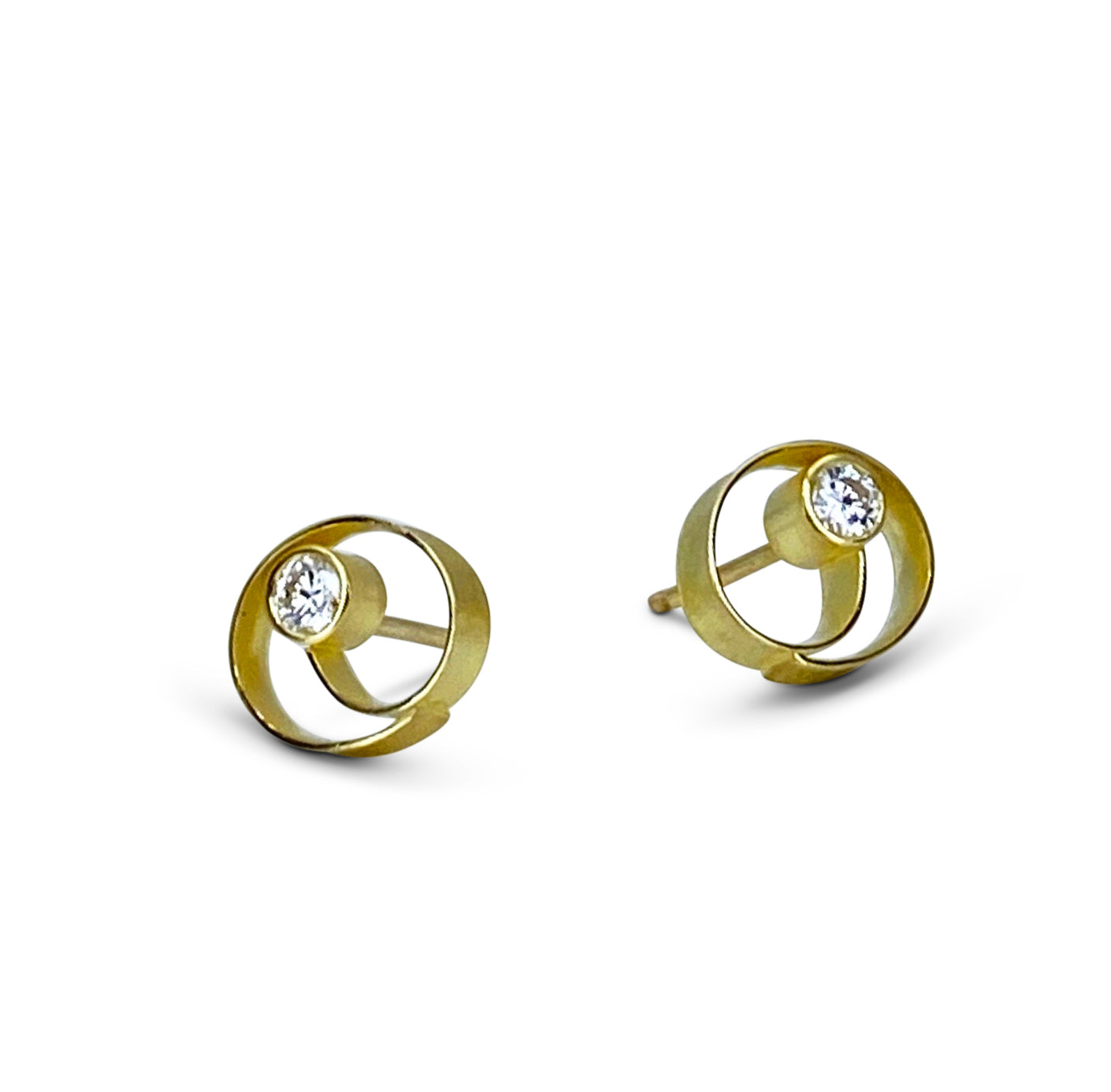 Coil style stud earrings in 18K yellow gold with diamonds by Ayesha Mayadas
