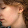 Petite V hoops sterling silver with Vermeil and diamonds on model by Ayesha Mayadas