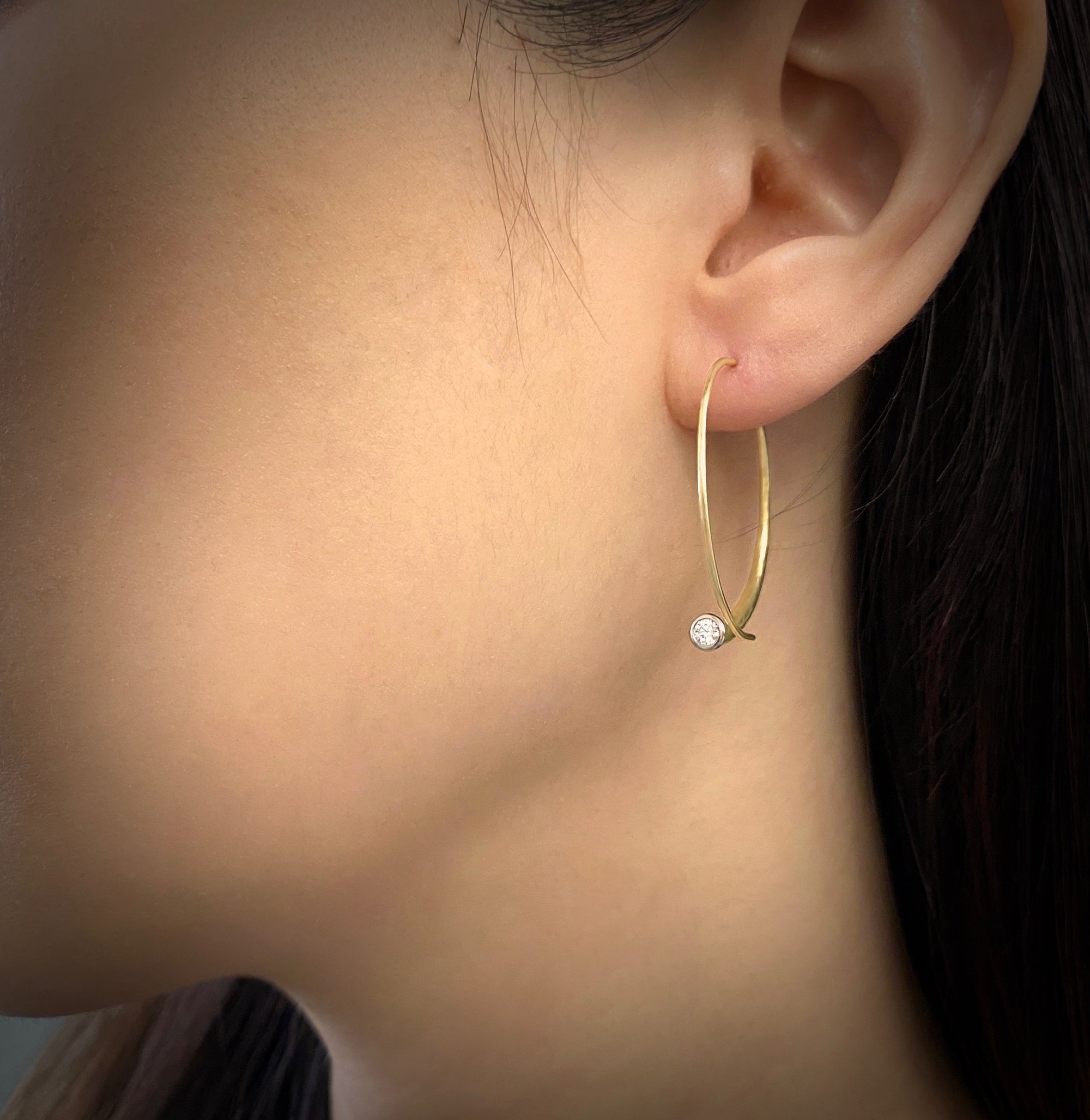 Vortex oval Hoop Earrings in 18K yellow gold or platinum and lab diamonds made by Ayesha Mayadas