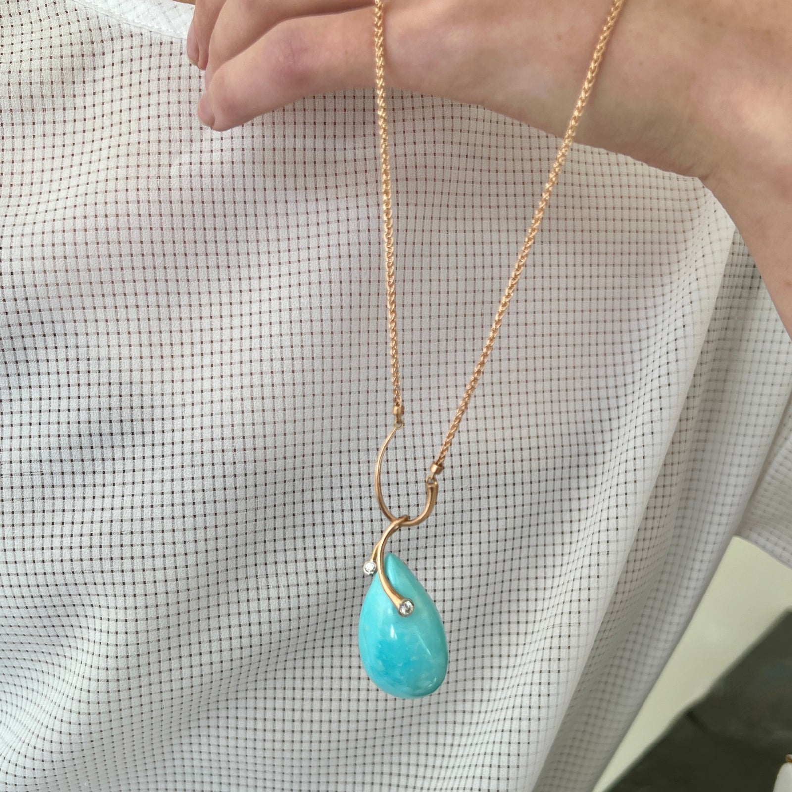 Turquoise pear shaped pendant with diamonds in 18K rose gold with 14K pink gold wheat chain made by Ayesha Mayadas