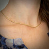 A delicate flowing necklace , hand forged in 18KY gold with platinum links by Ayesha Mayadas