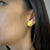 Round wafer stud earrings in sterling silver with an 18K yellow gold Vermeil finish by Ayesha Mayadas