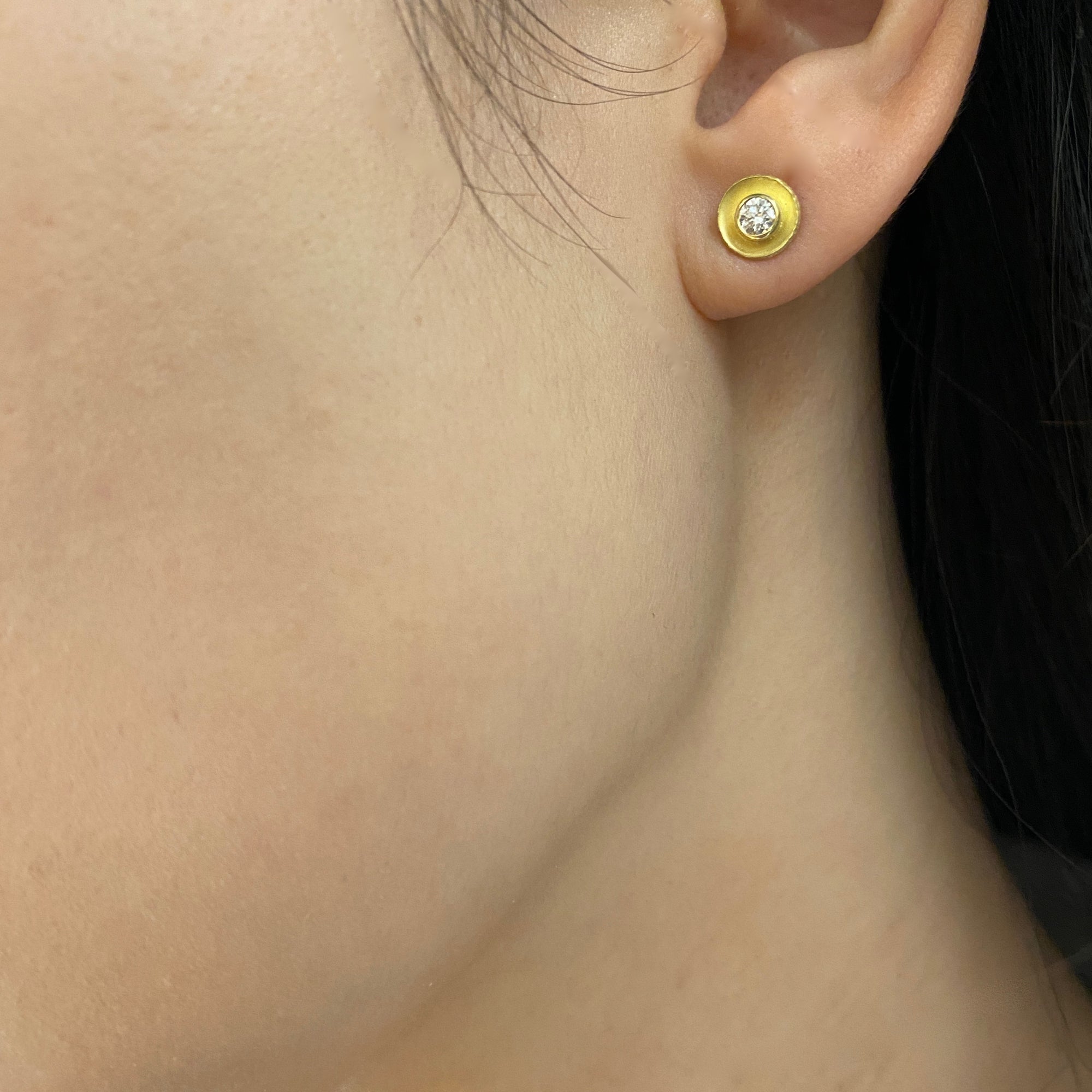 Petite concave 18K yellow gold brush finish earrings with 0.30 ct tw diamonds by Ayesha Mayadas