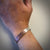 Rugged men's cuff in sterling silver and hammered copper by Ayesha Mayadas