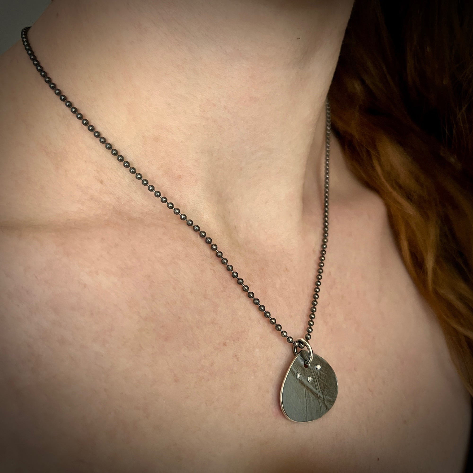 Pendant necklace with wafer texture in sterling silver with 3 diamonds oxidized ball chain by Ayesha Mayadas