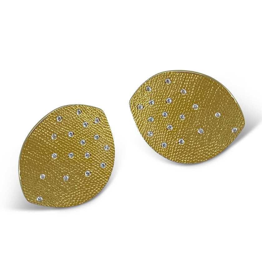 Textured leaf earrings in 18K yellow gold with diamonds by Ayesha Mayadas