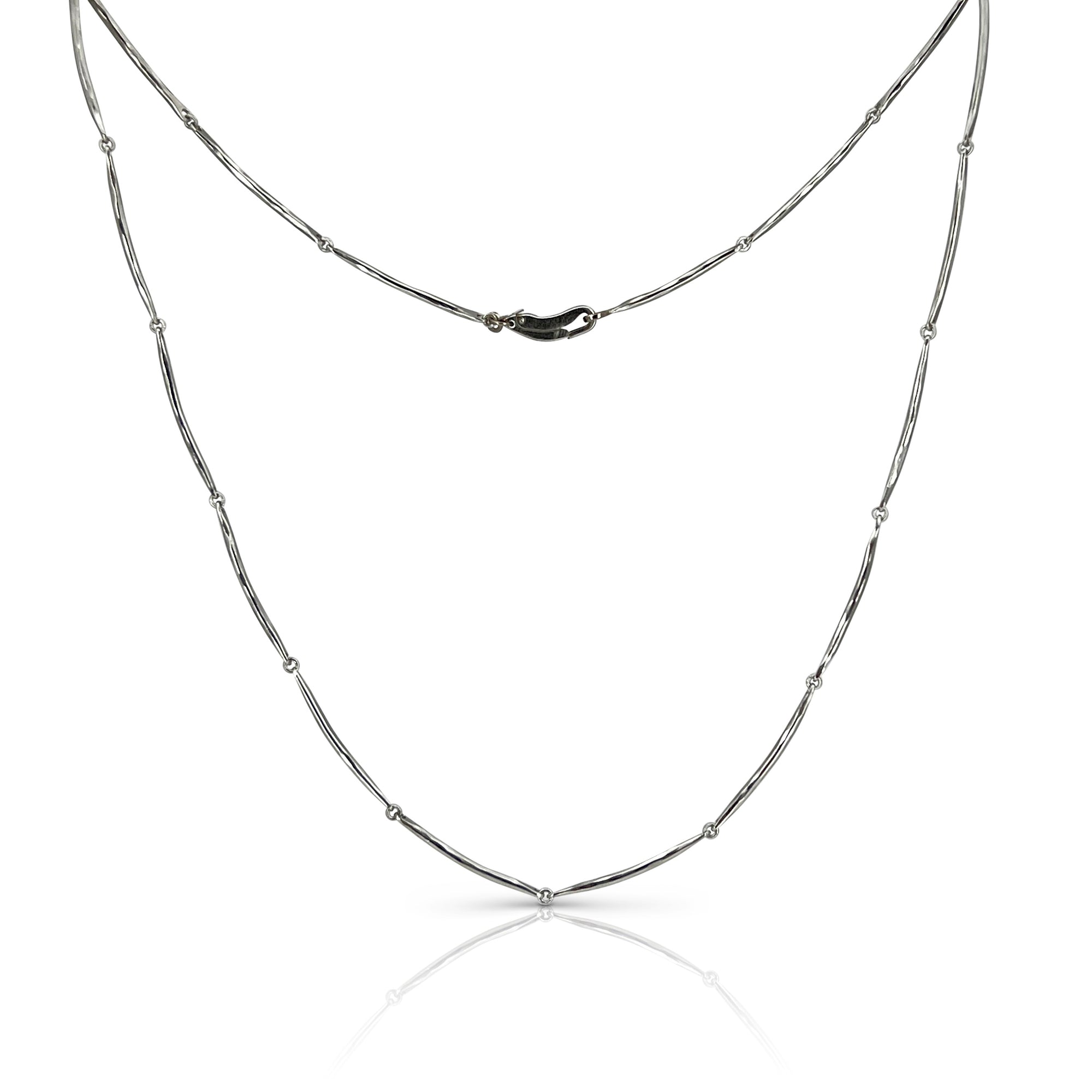 A delicate flowing necklace , hand forged in platinum by Ayesha Mayadas