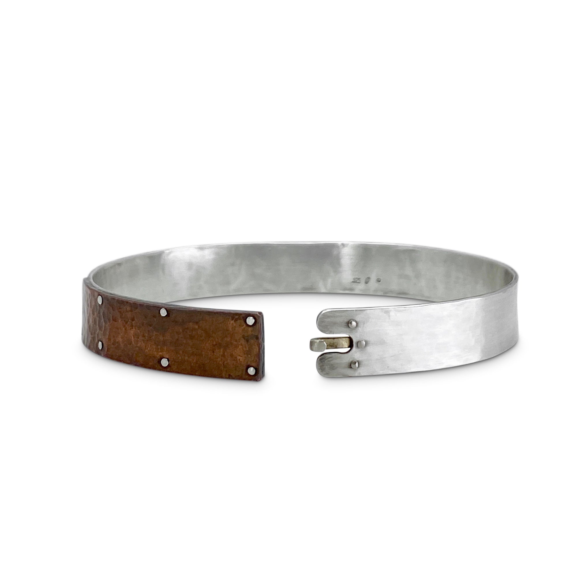Rugged men&#39;s cuff in sterling silver and hammered copper by Ayesha Mayadas