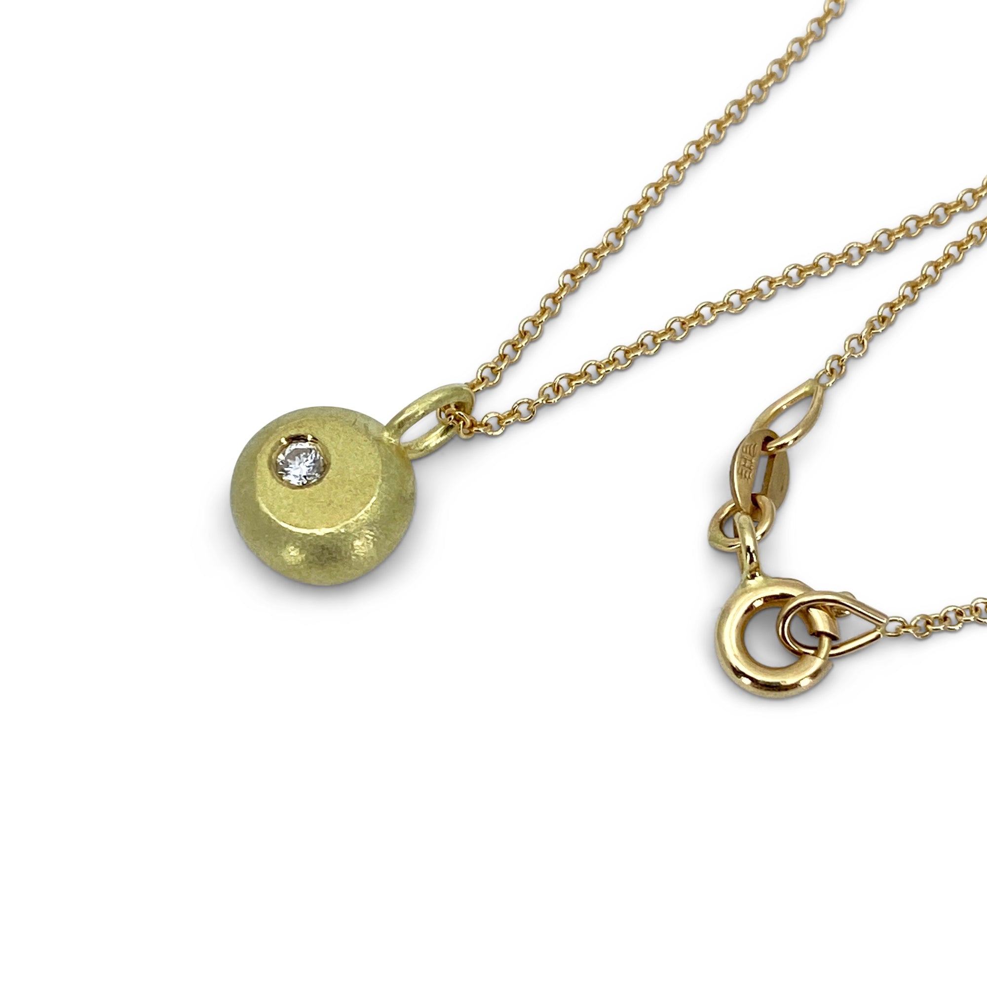 18K yellow gold and diamond pendant in a nugget motif and made by Ayesha Mayadas