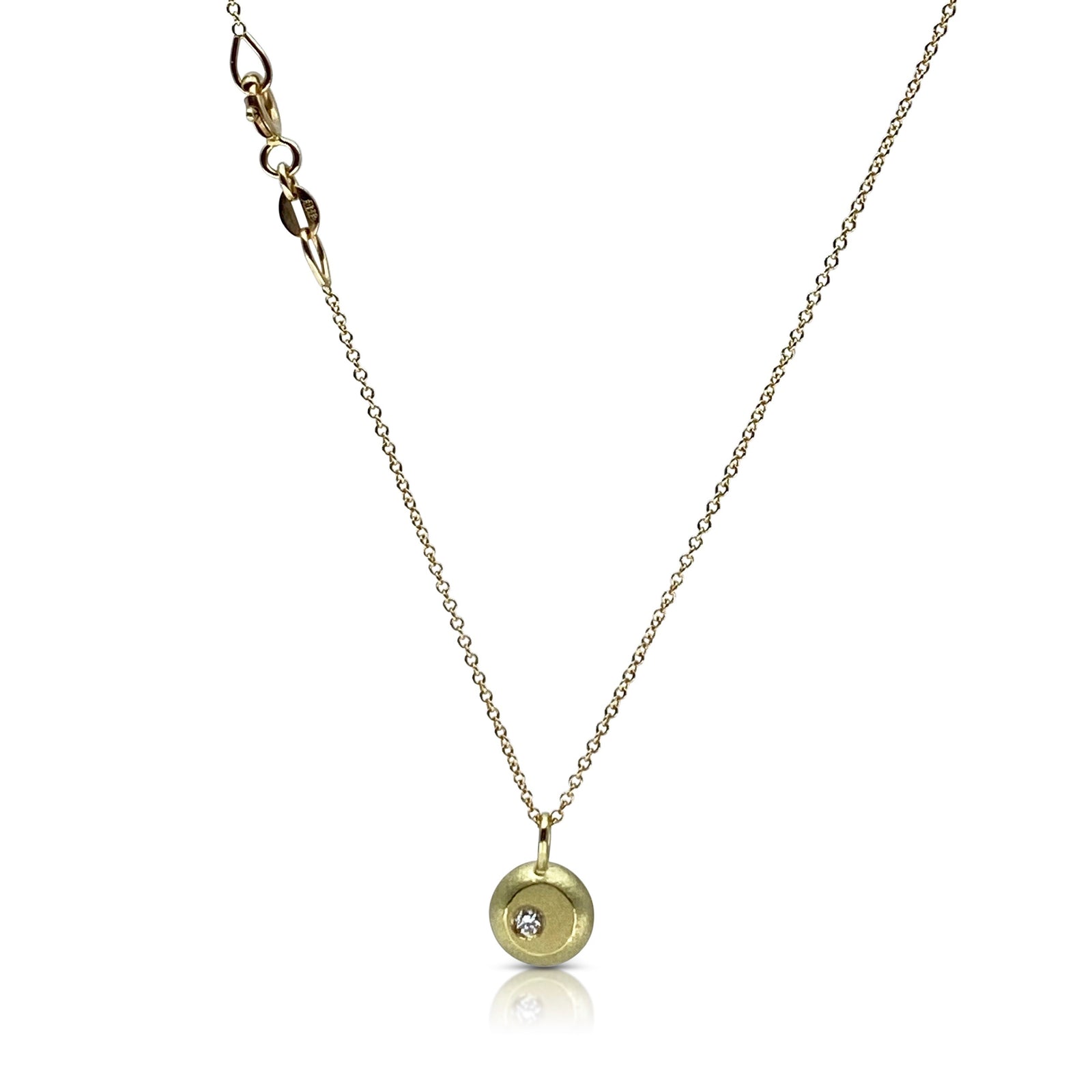 18Kt yellow gold and diamond pendant in a nugget motif made by Ayesha Mayadas
