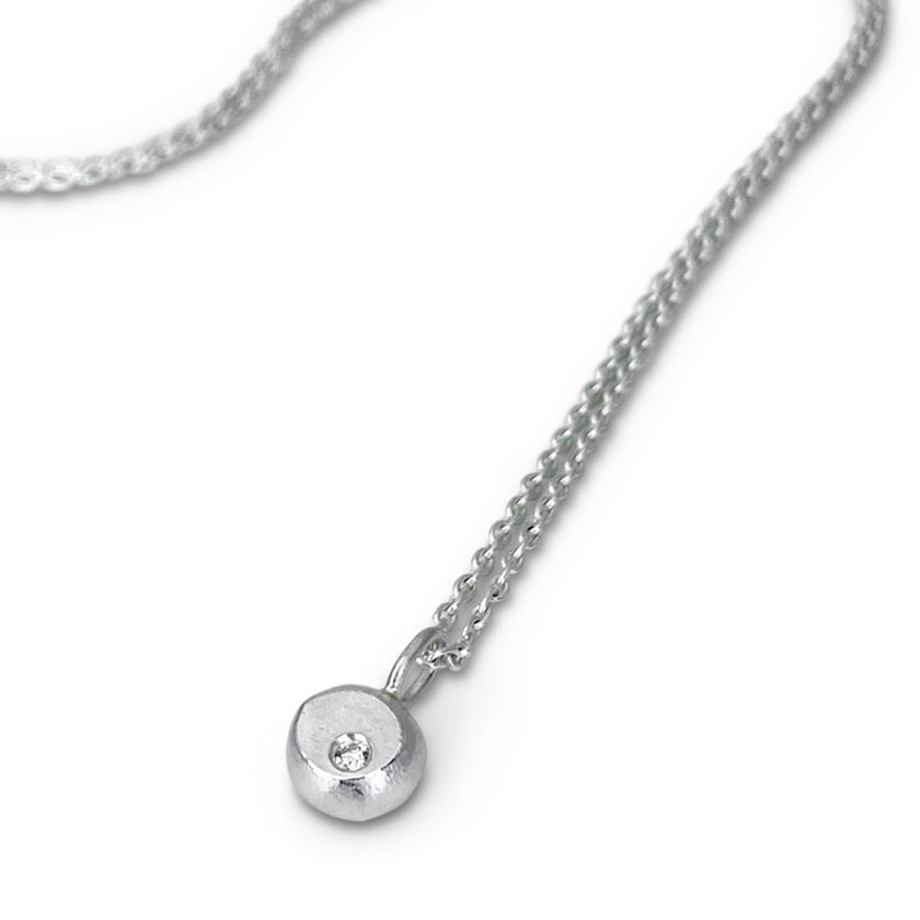 Sterling sillver and  diamond pendant in a nugget motif  made by Ayesha Mayadas 