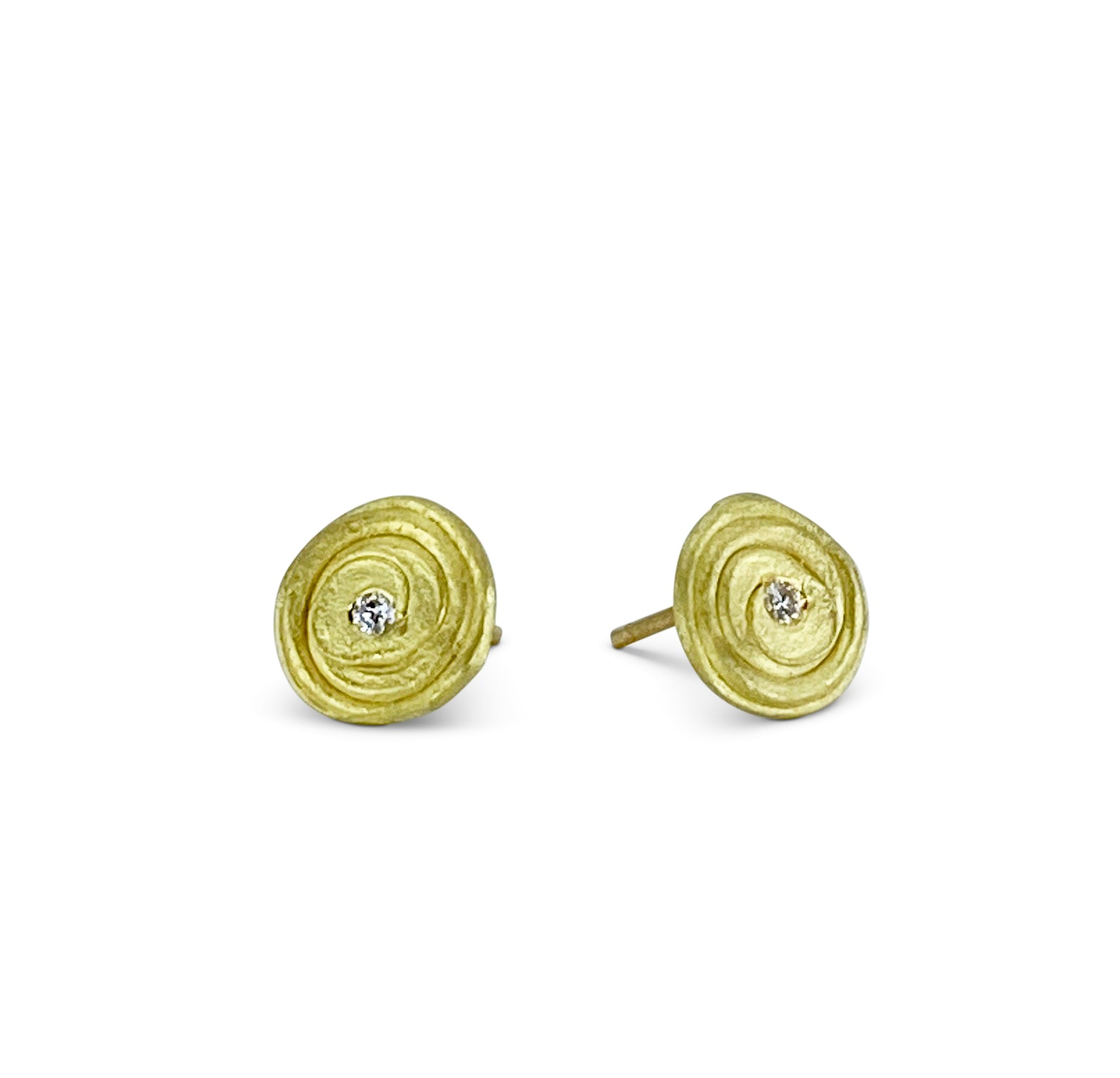 Spiral earrings in 18k yellow gold with diamonds made by Ayesha Mayadas