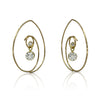 Spiral earrings in 18K yellow gold with a duo of dangling natural and lab grown diamonds made by Ayesha Mayadas