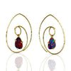 Spiral hoops in gold with dangling opals