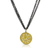 Spiral, coin-like pendant in 18K yellow gold with diamonds
