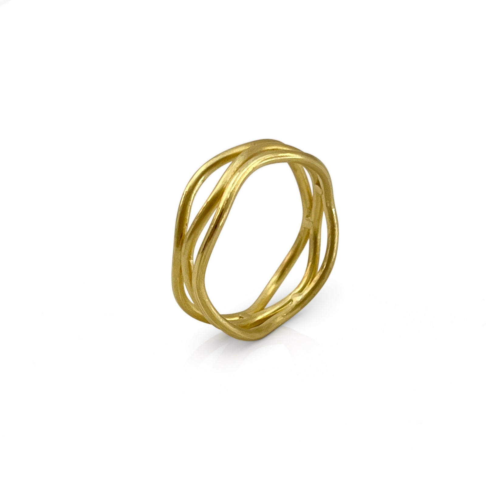 Triple layer serpentine ring in 18K yellow gold by Ayesha Mayadas