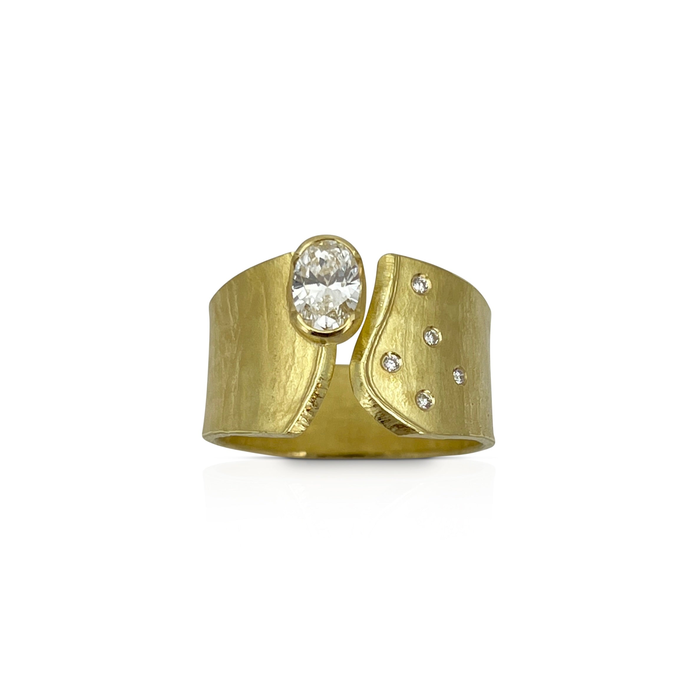 Wafer ring in 18K gold with oval lab created diamond and offset