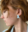 Iridescent blue enameled earrings in sterling silver