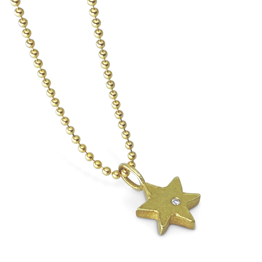 Star of David necklace in 18K yellow gold with a diamond and an oxidized sterling silver or 14K yellow gold cable chain by Ayesha Mayadas